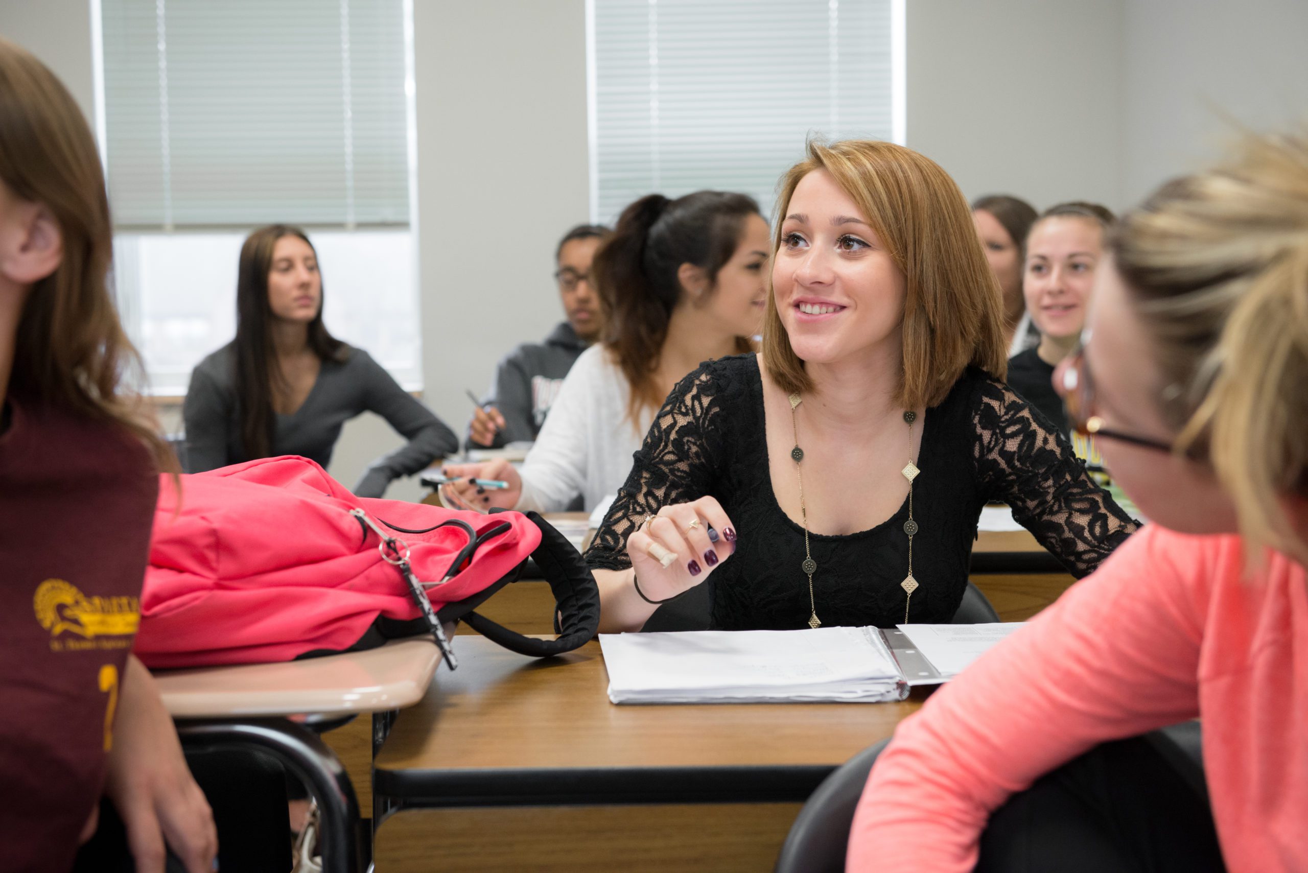 Students sitting at desks in a classroom.