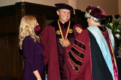 President Daly with his wife and another women