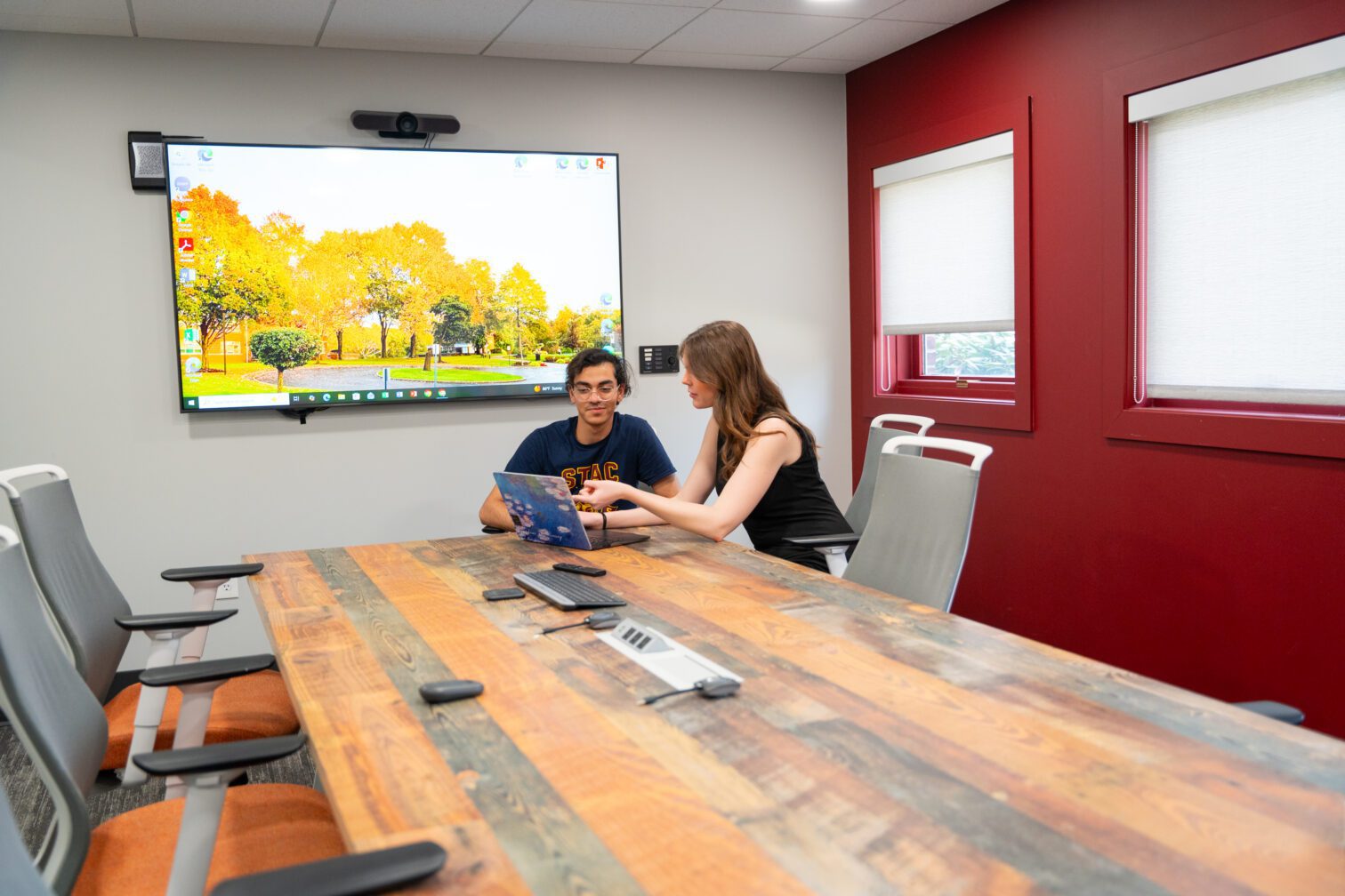 student discussing with staff